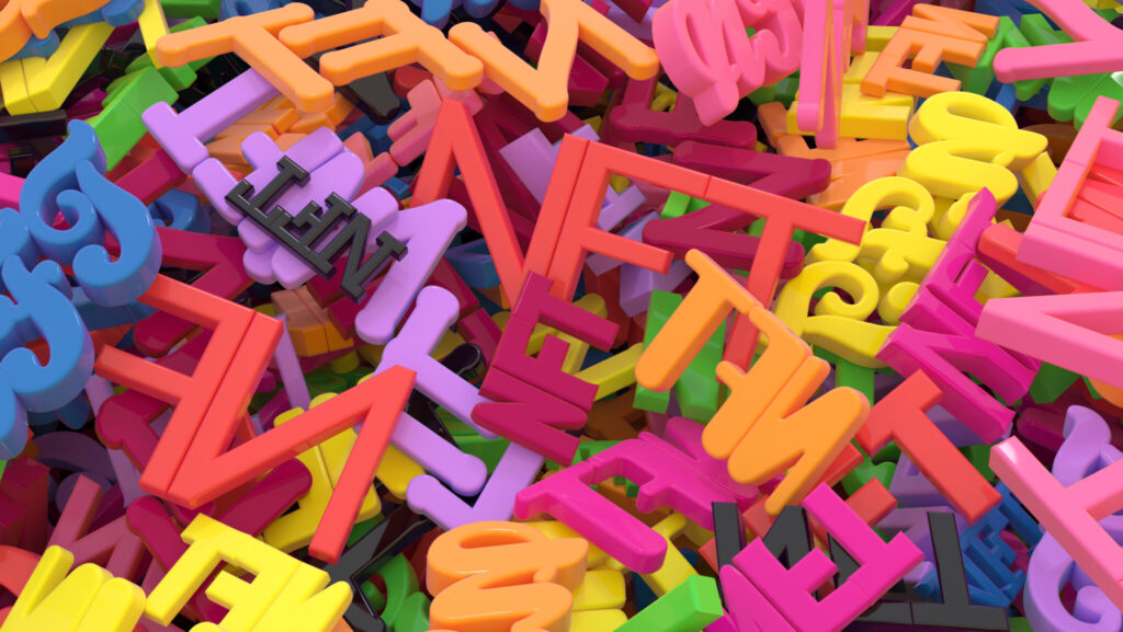 Digital background with heap of multicolored NFT signs